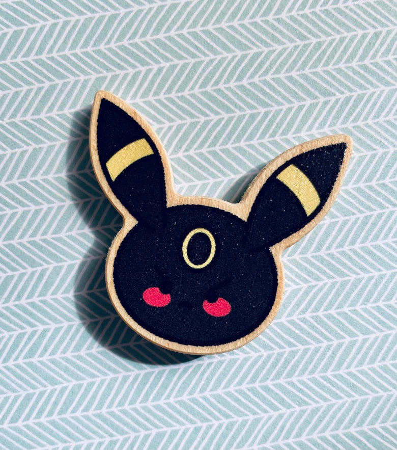 Pin’s en bois Evoli et ses évolutions