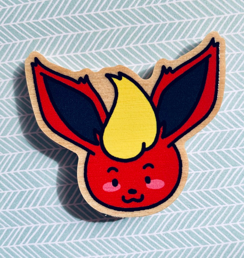 Pin’s en bois Evoli et ses évolutions